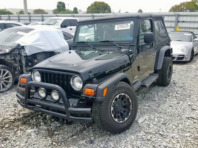 1J4FA49S34P785141 - 2004 JEEP WRANGLER / BLACK photo 2