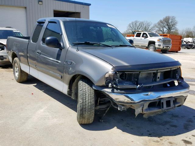 2FTRX17254CA45899 - 2004 FORD F-150 HERI GRAY photo 1