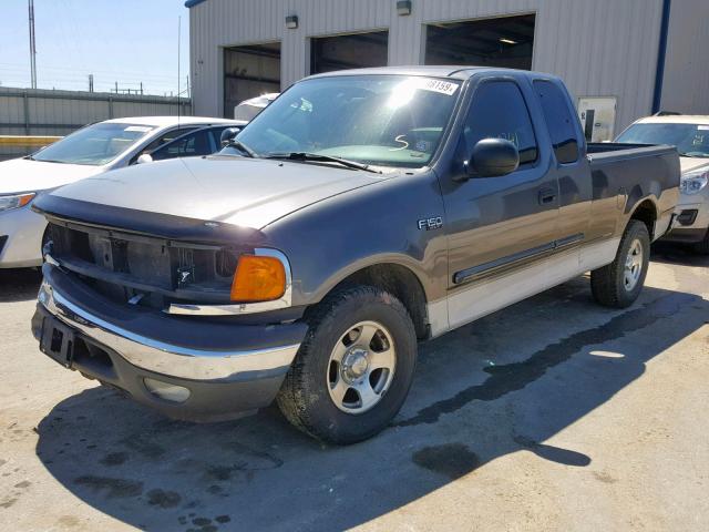 2FTRX17254CA45899 - 2004 FORD F-150 HERI GRAY photo 2