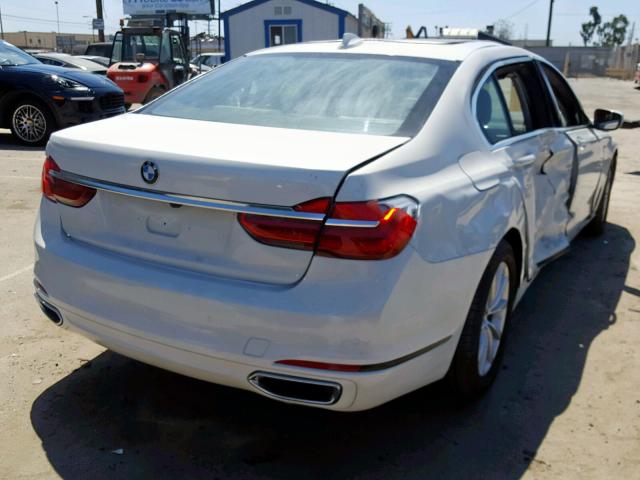 WBA7E2C50KB216731 - 2019 BMW 740 I WHITE photo 4