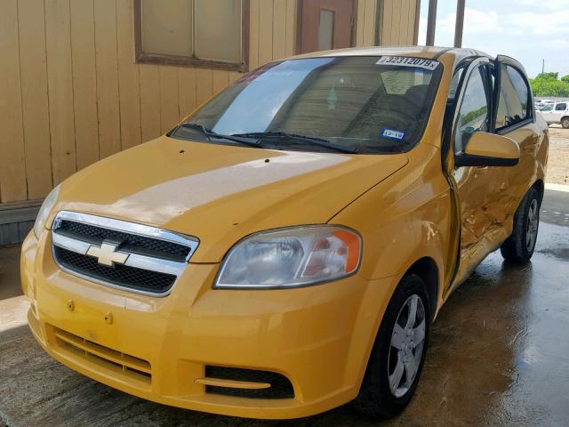 KL1TD5DE0BB155313 - 2011 CHEVROLET AVEO LS YELLOW photo 2