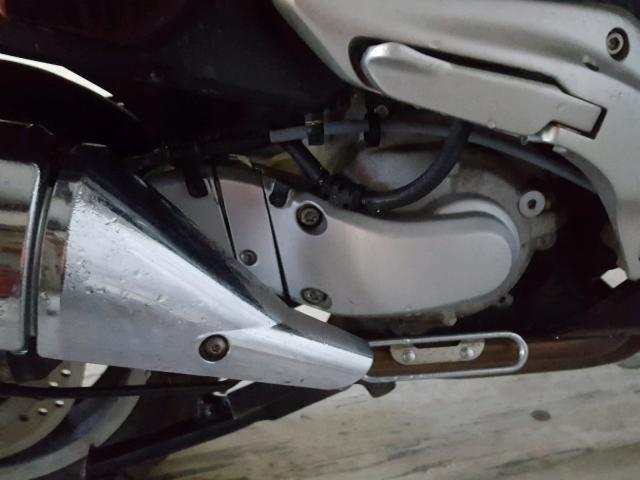 JH2PF01154K202094 - 2004 HONDA FSC600 D BURGUNDY photo 7