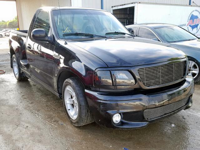 2FTZF0736YCB06592 - 2000 FORD F150 SVT L BLACK photo 1