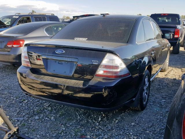 1FAHP27W88G113336 - 2008 FORD TAURUS SEL BLACK photo 4