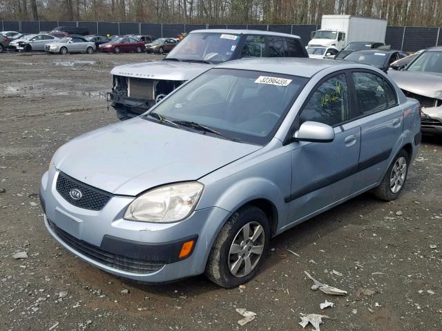 KNADE123866151980 - 2006 KIA RIO BLUE photo 2