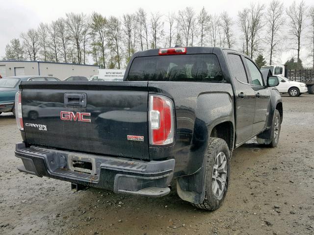 1GTG6BE39F1179329 - 2015 GMC CANYON SLE BLACK photo 4