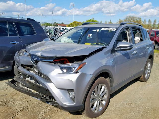 JTMDJREV4JD182769 - 2018 TOYOTA RAV4 HV LI SILVER photo 2