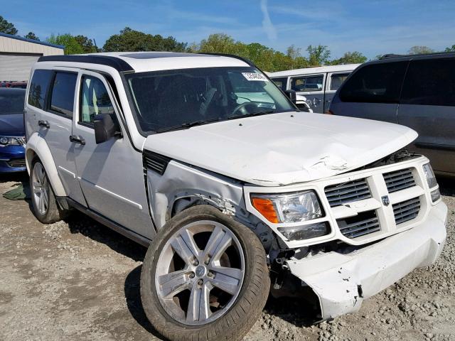 1D4PU4GX9BW587394 - 2011 DODGE NITRO HEAT WHITE photo 1