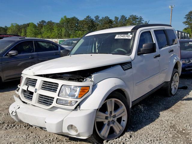 1D4PU4GX9BW587394 - 2011 DODGE NITRO HEAT WHITE photo 2