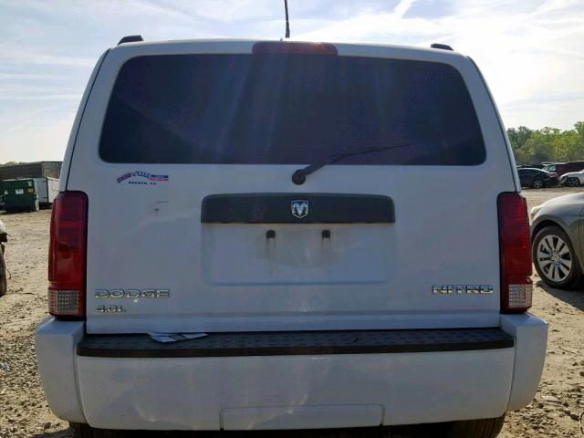 1D4PU4GX9BW587394 - 2011 DODGE NITRO HEAT WHITE photo 9