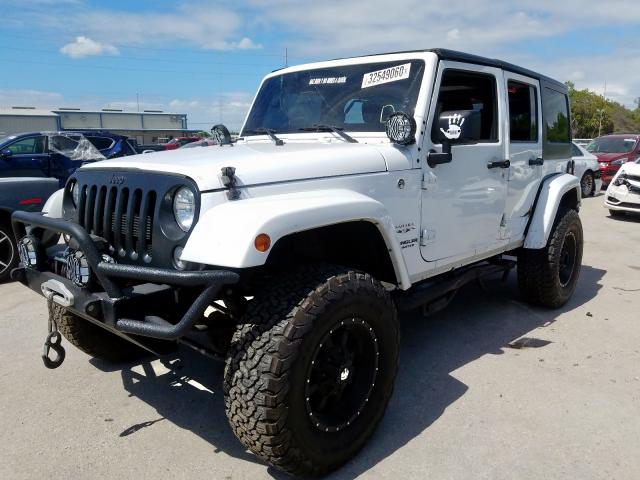 1C4BJWEG8GL125173 - 2016 JEEP WRANGLER UNLIMITED SAHARA  photo 2