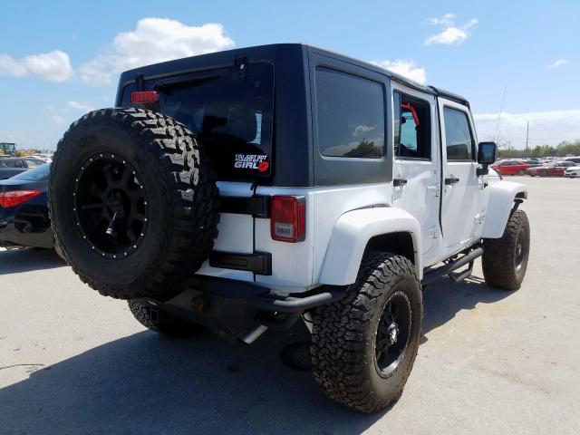 1C4BJWEG8GL125173 - 2016 JEEP WRANGLER UNLIMITED SAHARA  photo 4