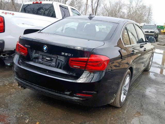 WBA8D9C50JEM34438 - 2018 BMW 330 XI BLACK photo 4