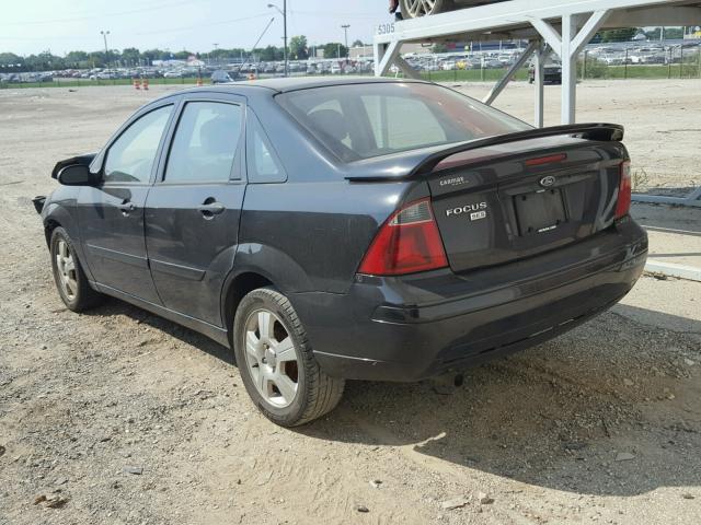 1FAHP34NX7W146067 - 2007 FORD FOCUS ZX4 BLACK photo 3