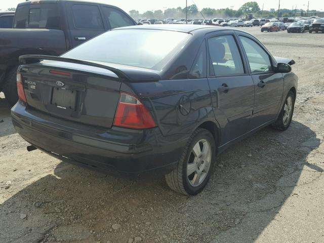 1FAHP34NX7W146067 - 2007 FORD FOCUS ZX4 BLACK photo 4