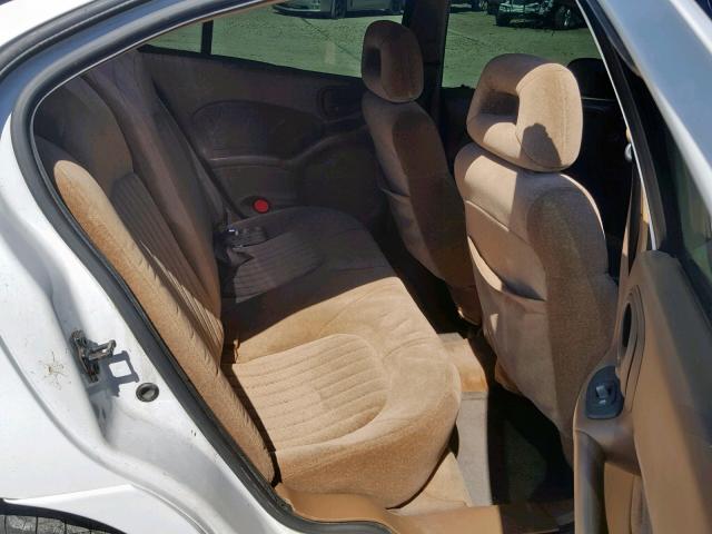 1G2NE52E5XC534475 - 1999 PONTIAC GRAND AM S WHITE photo 6