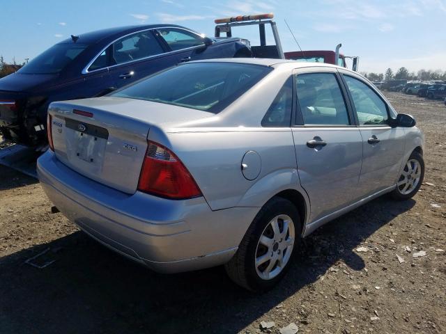 1FAFP34N95W215108 - 2005 FORD FOCUS ZX4  photo 4