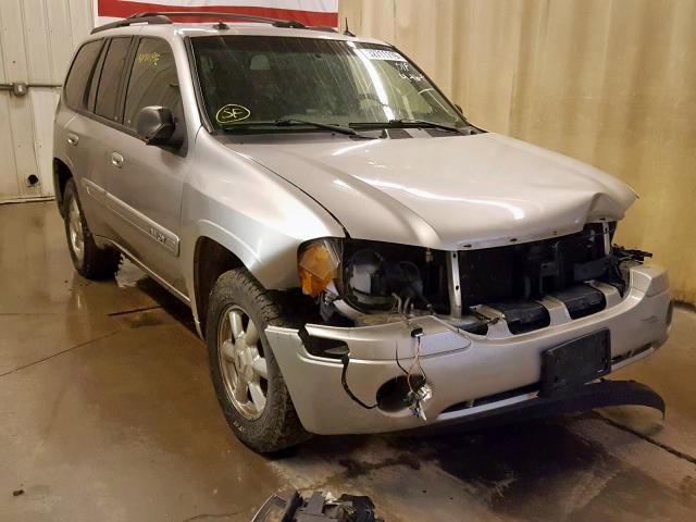 1GKDT13S942120549 - 2004 GMC ENVOY SILVER photo 1