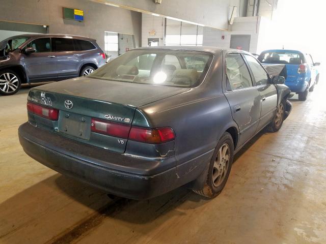 JT2BF28K3X0200091 - 1999 TOYOTA CAMRY LE  photo 4