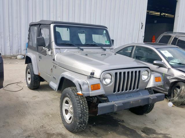 1J4FA39S42P719947 - 2002 JEEP WRANGLER / SILVER photo 1