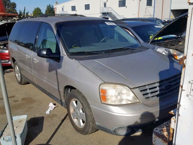 2FMDA57614BA47057 - 2004 FORD FREESTAR S SILVER photo 1