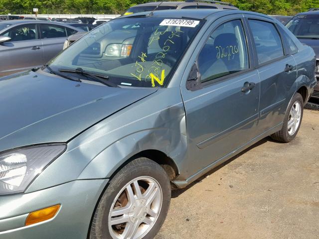 1FAFP34394W107343 - 2004 FORD FOCUS SE C GREEN photo 9