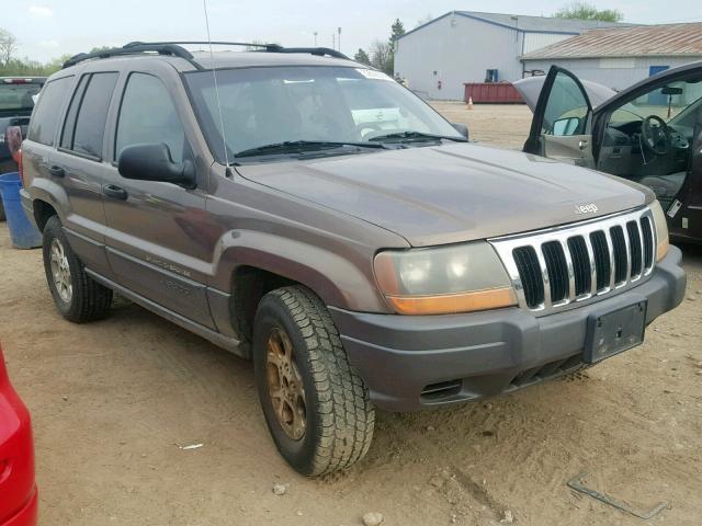 1J4GW48S91C716576 - 2001 JEEP GRAND CHER TAN photo 1