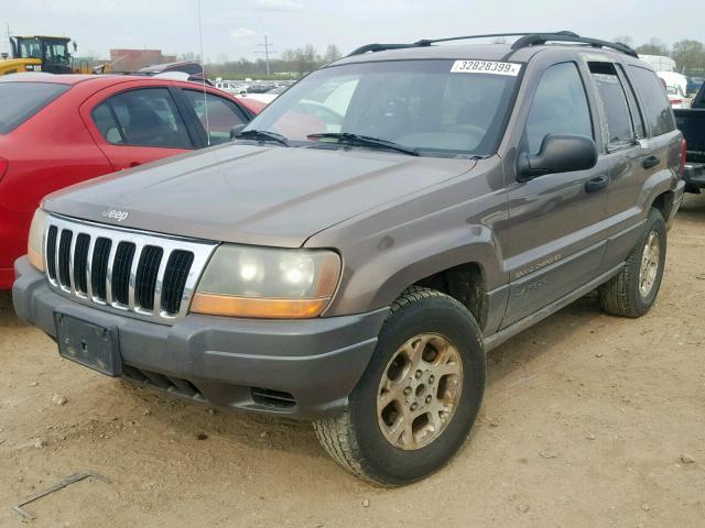 1J4GW48S91C716576 - 2001 JEEP GRAND CHER TAN photo 2