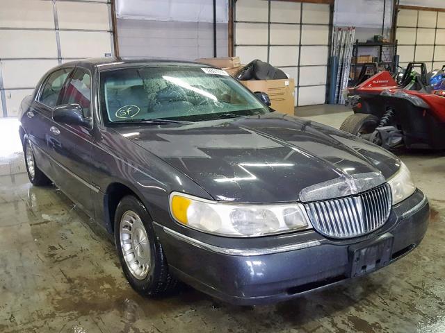 1LNHM81W71Y733976 - 2001 LINCOLN TOWN CAR E GRAY photo 1