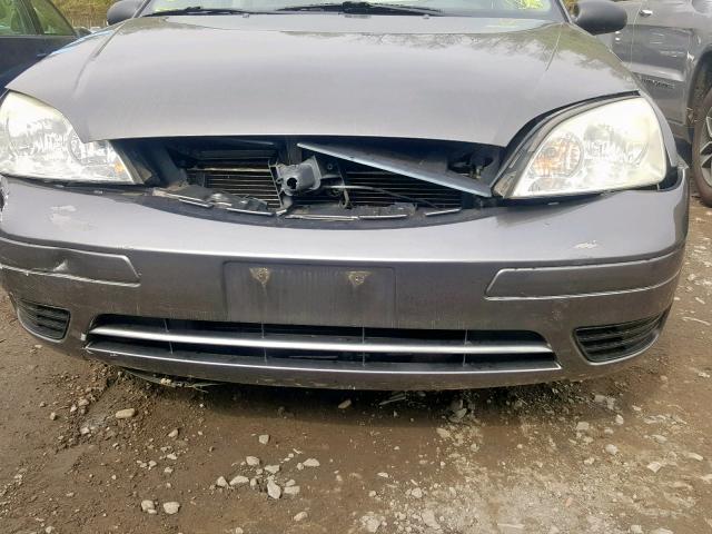 1FAFP34N85W273162 - 2005 FORD FOCUS ZX4 GRAY photo 7