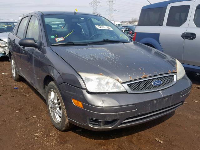 1FAFP34N05W135180 - 2005 FORD FOCUS ZX4 GRAY photo 1