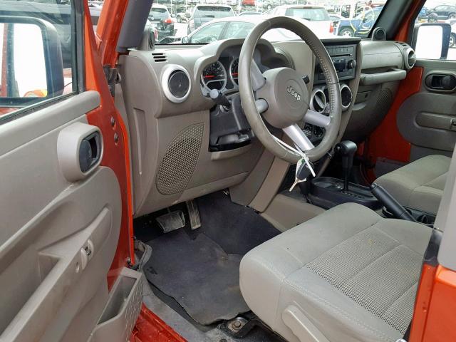 1J8FA54179L758607 - 2009 JEEP WRANGLER S ORANGE photo 9