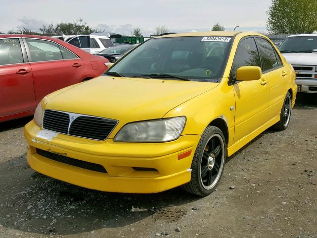 JA3AJ86E03U054803 - 2003 MITSUBISHI LANCER OZ YELLOW photo 2