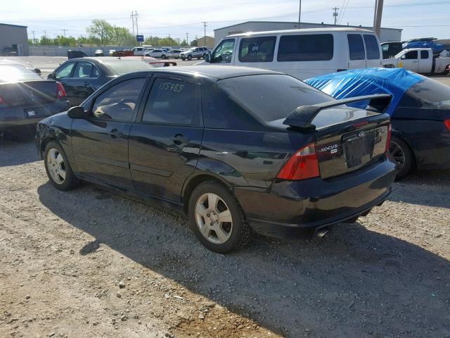 1FAHP34NX6W214530 - 2006 FORD FOCUS ZX4 BLACK photo 3