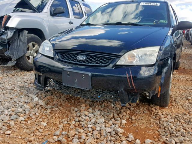 1FAHP34NX6W214530 - 2006 FORD FOCUS ZX4 BLACK photo 9