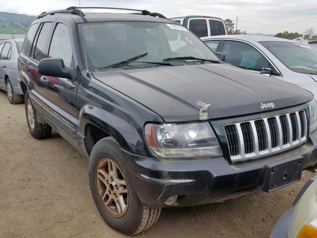 1J4GW48N14C135832 - 2004 JEEP GRAND CHER BLACK photo 1