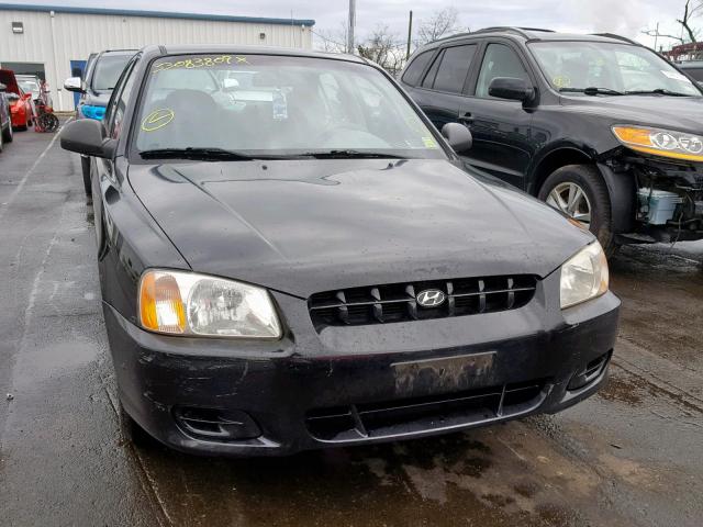 KMHCG45C42U323848 - 2002 HYUNDAI ACCENT GL BLACK photo 9