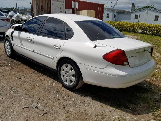 1FAFP5223YA155199 - 2000 FORD TAURUS LX WHITE photo 3