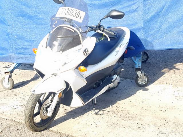 MLHJF2809B5001704 - 2011 HONDA PCX WHITE photo 2