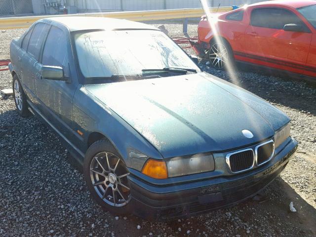 WBACD4323WAV64148 - 1998 BMW 328 I AUTO GREEN photo 1