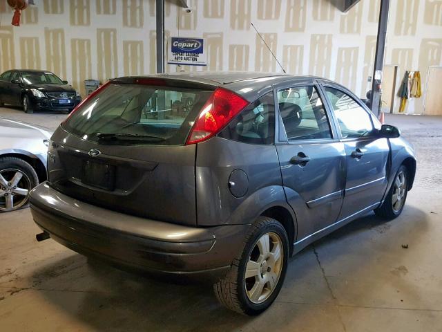 1FAHP37N37W345179 - 2007 FORD FOCUS ZX5 GRAY photo 4