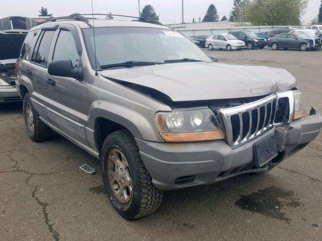 1J4GW58N5XC748966 - 1999 JEEP GRAND CHER GRAY photo 1