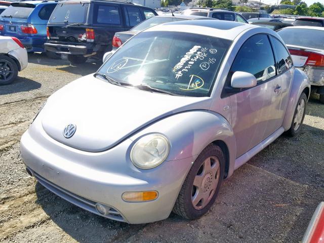 3VWCC21C2YM404352 - 2000 VOLKSWAGEN NEW BEETLE ნაცრისფერი ფოტო 2