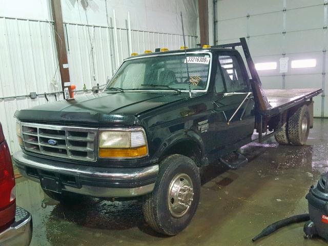 1FDLF47F1VEB32171 - 1997 FORD F SUPER DU BLACK photo 2