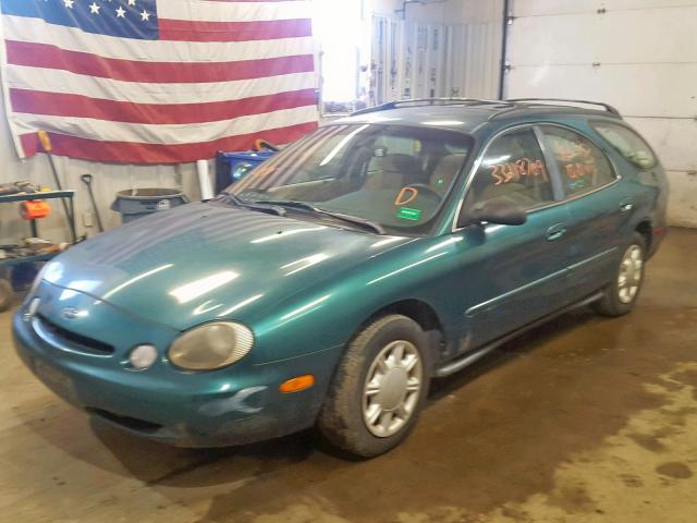 1FALP57U1TG200143 - 1996 FORD TAURUS GL GREEN photo 2