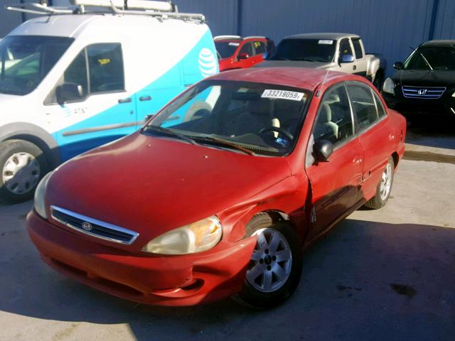 KNADC123826164874 - 2002 KIA RIO RED photo 2