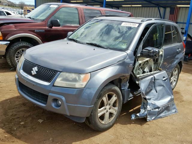 JS3TE947264102798 - 2006 SUZUKI GRAND VITA GRAY photo 2