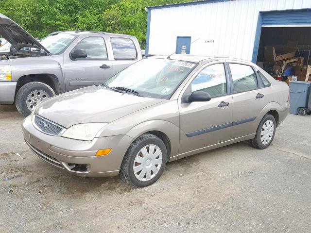 1FAFP34N85W166662 - 2005 FORD FOCUS ZX4 BEIGE photo 9