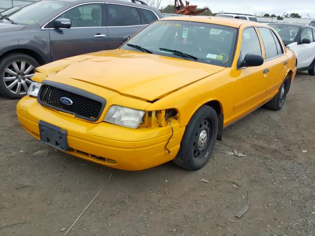 2FABP7AV1BX127504 - 2011 FORD CROWN VICT YELLOW photo 2