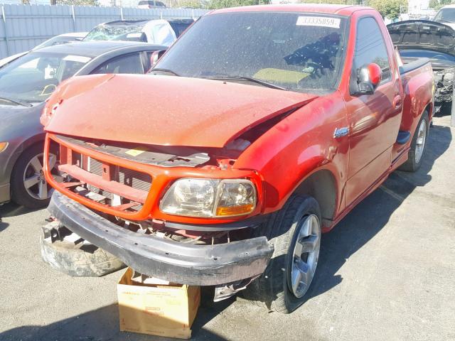 2FTZF07311CA41818 - 2001 FORD F150 SVT L RED photo 2